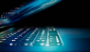 Closeup on personal computer, cyber security