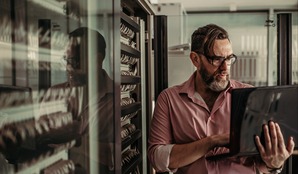 Man with a computer, customers care about cyber security